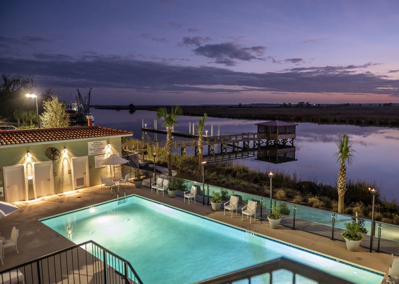 Among the amenities at Oaks on the River Boutique Resort is an outdoor heated pool with bar and a private dock. COURTESY OF 360 DEGREE TOTAL MARKETING