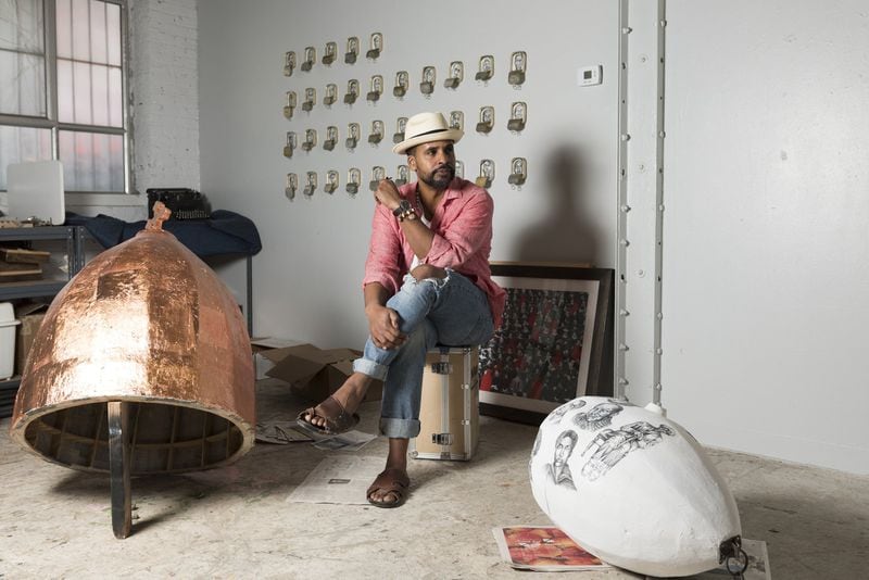 Atlanta-based artist and actor Masud Olufani poses for a portrait in his studio in Atlanta, Georgia, on Tuesday, March 21, 2017.  