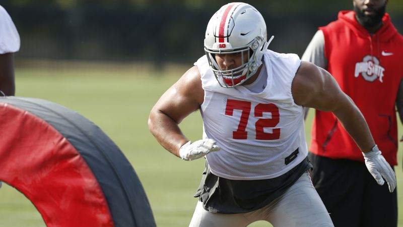 Ohio State defensive lineman Tommy Togiai runs a drill during NCAA college football practice, Friday, Aug. 2, 2019, in Columbus, Ohio. (Jau LaPrete/AP)