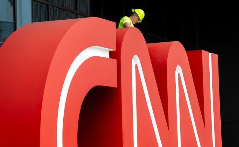 The CNN sign in front of the CNN Center along Centennial Olympic Park Drive in downtown Atlanta was dismantled and moved to Turner Broadcasting on Monday, March, 4, 2024.  (John Spink / John.Spink@ajc.com)

