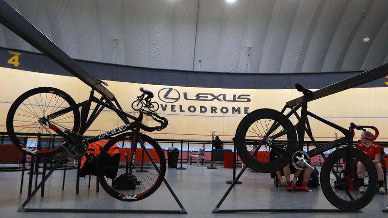 In a photo from Thursday, Jan. 18, 2018, riders cycle in the Lexus Velodrome in Detroit. The indoor cycling track is expected to draw bike riders from other cold-weather states and across the U.S. while giving inner-city youth an opportunity to participate for free in the fast-moving and growing sport. The Lexus Velodrome joins a training facility in Colorado Springs and a venue in Los Angeles as the only indoor velodromes in the U.S. (AP Photo/Carlos Osorio)