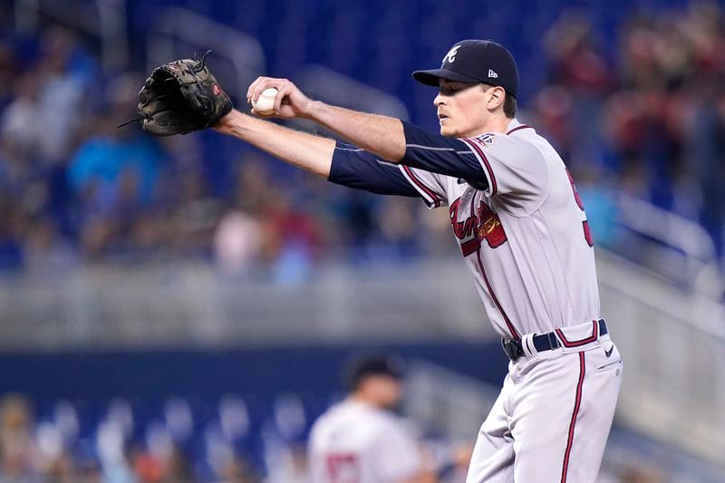 Atlanta Braves starting pitcher Max Fried stretches on the mound after giving up a double to Miami Marlins' Adam Duvall during the first inning of a baseball game, Saturday, July 10, 2021, in Miami. (AP Photo/Lynne Sladky)