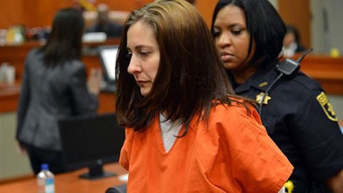 Andrea Sneiderman was initially implicated in the death of her husband, Rusty, outside a Dunwoody daycare in 2010. Her boss, Hemy Neuman, was convicted of murder, and at a subsequent trial she was convicted of lying during the investigation. She was released 10 months into a 5-year prison sentence.