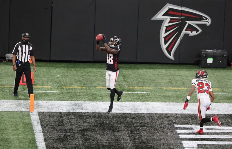 Falcons wide receiver Calving Ridley is wide open for a touchdown throw from Matt Ryan against Buccaneers' Sean Murphy-Bunting Sunday, Dec. 20, 2020, in Atlanta.  (Curtis Compton / Curtis.Compton@ajc.com)