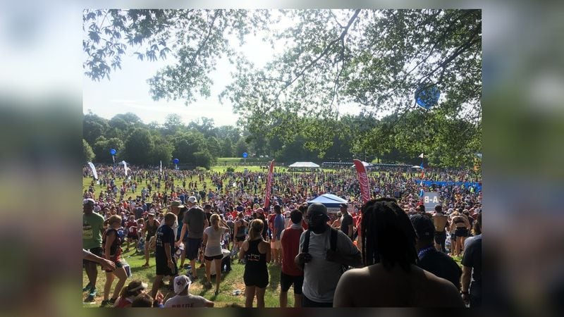 A huge crowd lingered in Piedmont Park at the AJC Peachtree Road Race Tuesday. LINDSEY CONWAY / SPECIAL
