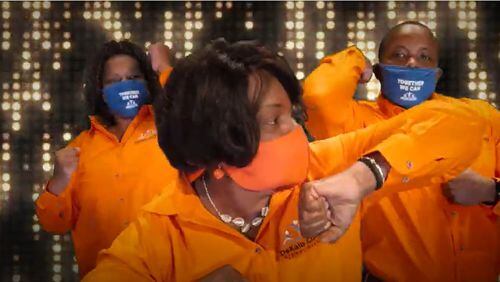 DeKalb County Schools teachers "wave them bows" in a district pandemic safety campaign on YouTube.