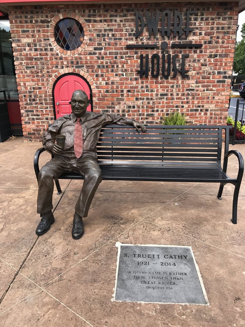 Chick-fil-A Hapeville Dwarf House is where S. Truett Cathy invented a fried chicken sandwich that led to the birth of the Chick-fil-A restaurant concept. A statue of Cathy sits in front of the restaurant’s entrance. LIGAYA FIGUERAS / LFIGUERAS@AJC.COM