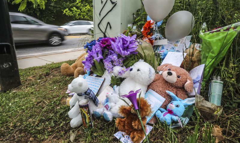 May 3, 2021 Atlanta: A growing memorial is seen for 15-year old  Diamond Johnson who was shot and killed over the weekend near the Glenwood Park shopping plaza. (John Spink / John.Spink@ajc.com)

