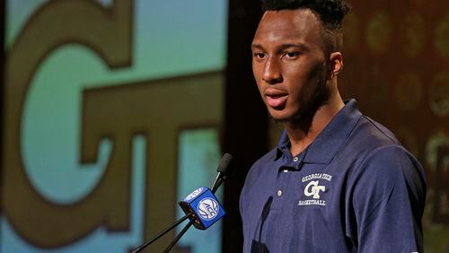 Georgia Tech's Josh Okogie answers a question during the Atlantic Coast Conference men's NCAA college basketball media day in Charlotte, N.C., Wednesday, Oct. 25, 2017. (AP Photo/Chuck Burton)