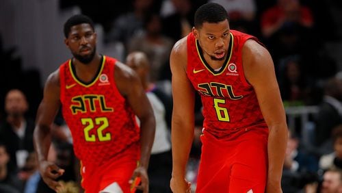 Omari Spellman  of the Atlanta Hawks reacts after hitting a 3-point basket against the New York Knicks at State Farm Arena on November 7, 2018 in Atlanta, Georgia.