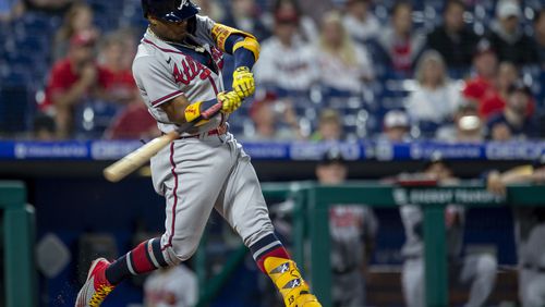 Atlanta Braves' Ronald Acuna Jr. hits a home run during the third inning of a baseball game against the Philadelphia Phillies, Tuesday, June 8, 2021, in Philadelphia. (AP Photo/Laurence Kesterson)