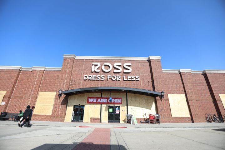 In Atlanta, Ross Store on Edgewood Retail Center protected the entrance and windows with plywood, but a sign welcomes shoppers. Business around town are boarding up windows amid fears of unrest  related to the elections on Tuesday, Nov. 3, 2020, 
Miguel Martinez for The Atlanta Journal-Constitution