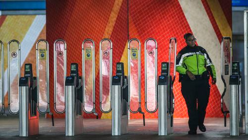 April 14, 2017 Atlanta: MARTA police patrol the gates at the West Lake MARTA station Friday, April 14, 2017 while Fulton County authorities identified the man accused in a brazen shooting that killed one MARTA train rider and injured three others. Chauncey Lee Daniels faces murder and assault charges in the Thursday shooting at the West Lake station, which killed Zachariah Hunnicutt, 38. Police havent revealed why Daniels would target anyone. MARTA Police Chief Wanda Dunham said officers would be an increased presence at all stations Friday.  She called the shooting targeted but isolated. Our officers acted swiftly in apprehending the suspect at the West Lake station, she said in a statement. Those injured passengers were treated by EMS and transported to Grady Memorial Hospital with non-life-threatening injuries. The shooting was the fifth murder investigation MARTA police have had to undertake this fiscal year.  But in a recent presentation to media Dunham and other officials touted a 27 percent decrease in serious crime on the system. She attributed higher police visibility, 10,000 cameras installed on the system and the suspensions of problem riders. Still, she acknowledged the spate of killings, which is highly unusual, considering that in the previous four fiscal years there were zero. Murder charges and arrests also came in the other cases. JOHN SPINK /JSPINK@AJC.COM