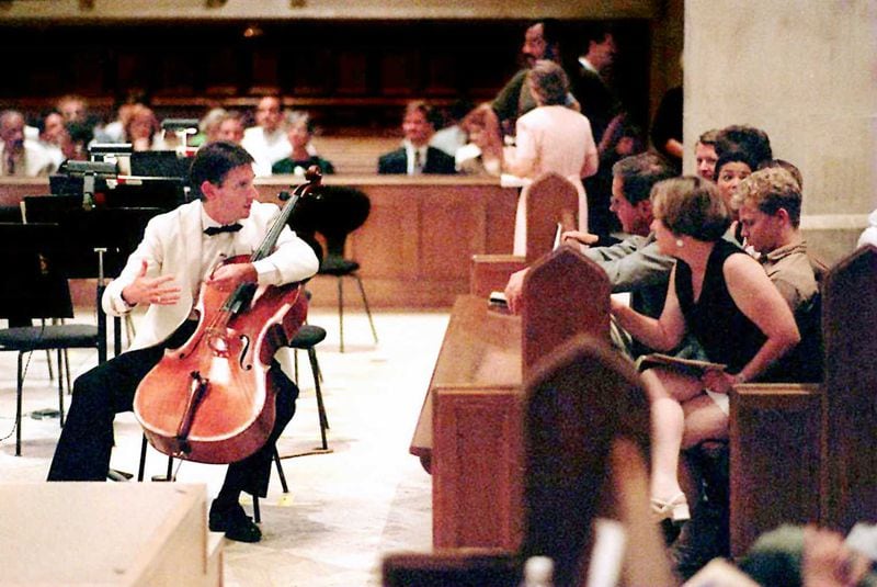 Christopher Rex talks with the audience at the Cathedral of St. Phillip during a pre-concert discussion in this undated photo.
