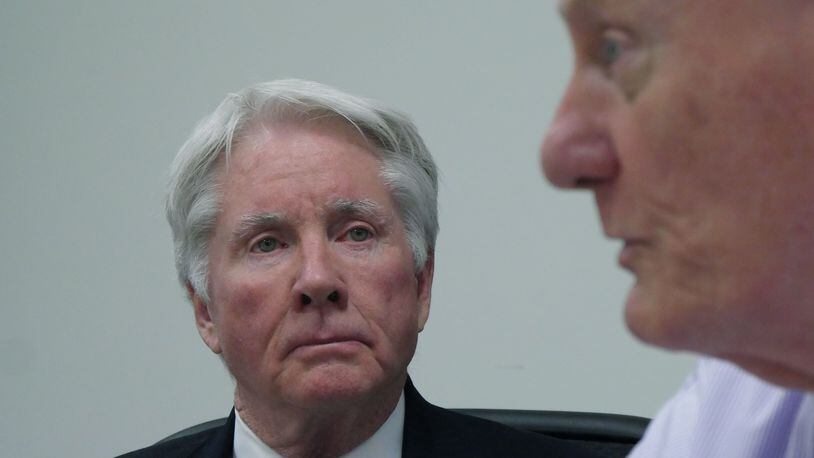 November 17, 2016 Decatur - Claud “Tex” McIver looks as his lawyer Steve Maples speaks on Thursday, November 17, 2016. McIver, an Atlanta lawyer, said he accidentally shot his wife Diane McIver Sunday, Sept. 25, while the couple headed home in their SUV. HYOSUB SHIN / HSHIN@AJC.COM