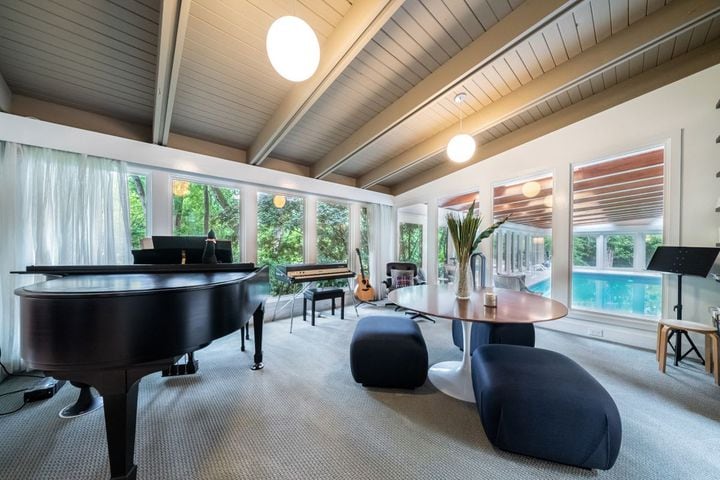 Photos: Indoor pool, infinity tub complete renovated mid-century modern home