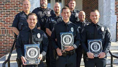Canton police officers were awarded at a recent City Council for quick thinking and life-saving actions that rescued several residents from a fire. CONTRIBUTED