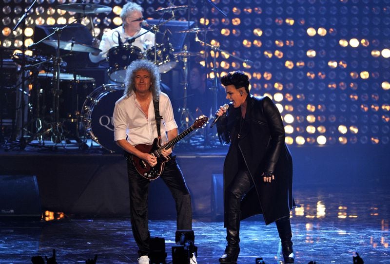 BELFAST, NORTHERN IRELAND - NOVEMBER 06:  Brian May of Queen and Adam Lambert perform onstage during the MTV Europe Music Awards 2011 live show at at the Odyssey Arena on November 6, 2011 in Belfast, Northern Ireland.  (Photo by Gareth Cattermole/Getty Images)