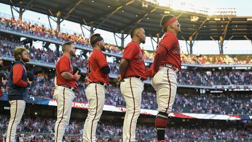The capacity crowd at Truist Park was loud and proud throughout Friday's 5-2 victory over the Mets in the first of a key three-game series between the NL East frontrunners. (Daniel Varnado/For the AJC)