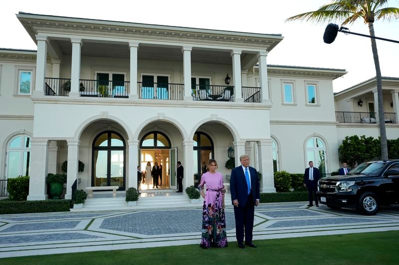 Former President Donald Trump and Melania Trump arrive for a GOP fundraiser Saturday in Palm Beach, Florida, that Trump’s campaign said raised $50.5 million. (AP Photo/Lynne Sladky)