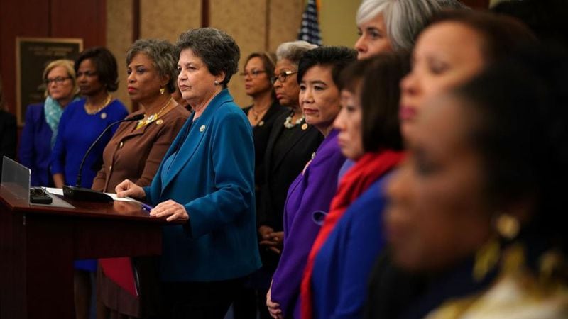 U.S. Rep. Lois Frankel (D-FL) (4th L) speaks as she holds a news conference with other Democratic Congress members, including Rep. Brenda Lawrence (D-MI) (3rd L) and Rep. Judy Chu (D-CA) (7th L), December 12, 2017 on Capitol Hill in Washington, DC. House Democrats call on "investigating President Trump for sexual misconduct." (Photo by Alex Wong/Getty Images)