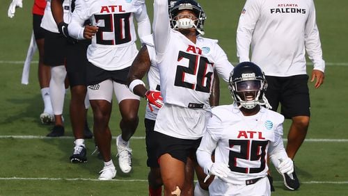 081920 Flowery Branch: Atlanta Falcons cornerbacks (20) Kendall Sheffield (from left), Isaiah Oliver, and Josh Hawkins run an agility drill with the cornerbacks group during training camp on Wednesday, August 19, 2020 in Flowery Branch.    Curtis Compton ccompton@ajc.com