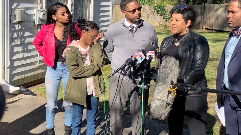The Savage family - from left, Jailyn, Jori, Timothy and Jonjelyn  - along with lawyer Gerald Griggs (far right), met with the press on Wednesday morning to talk about their daughter, Joycelyn, whom they haven't seen in the two years since she's been with R. Kelly.