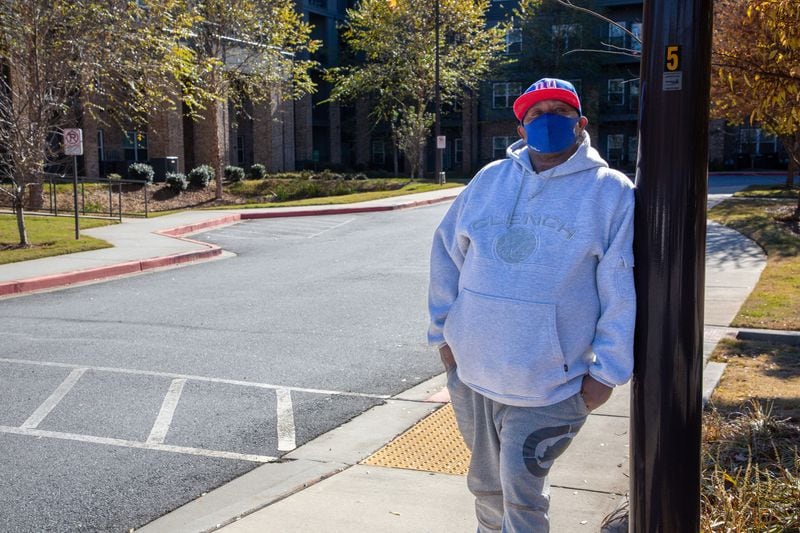 Resident Kenneth Walker stands outside the Manor at Indian Creek apartments in Stone Mountain Mondy, November 29, 2021.  STEVE SCHAEFER FOR THE ATLANTA JOURNAL-CONSTITUTION