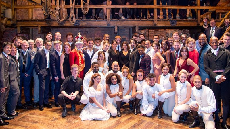 Meghan, Duchess of Sussex (C) and Prince Harry, Duke of Sussex meet the cast and crew of 'Hamilton' backstage after the gala performance in support of Sentebale at Victoria Palace Theatre on August 29, 2018 in London, England.