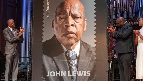 A ceremony Friday at Morehouse College's Martin Luther King Jr. International Chapel marked the first day of sale of a forever stamp honoring the late U.S. Rep. John Lewis. The gathering also served as the first public memorial to the life and legacy of the civil rights icon. Lewis died during the coronavirus pandemic, when it wasn't possible to hold such an event. (Jenni Girtman for The Atlanta Journal-Constitution)