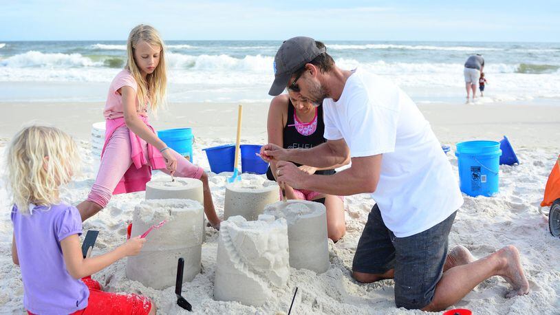 Go beyond the basic pail-and-shovel creation by signing up the whole family for a course at Sand Castle University. Contributed by Gulf Shores & Orange Beach Tourism