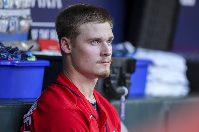 Atlanta Braves starting pitcher AJ Smith-Shawver watches from the dugout as the Braves bat during the first inning against the Washington Nationals at Truist Park, Friday, June 9, 2023, in Atlanta. This is Smith-Shawver’s first MLB start. (Jason Getz / Jason.Getz@ajc.com)