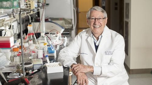 Dr. Max Cooper poses for a photo in a research laboratory next to his office at Emory University School of Medicine on Friday, Jan. 26, 2018. Cooper, a pediatrician and professor of pathology and laboratory medicine, is being honored in the category “Medical Science and Medicinal Science” for research that identified the cellular building blocks of the immune system as we understand it today.ALYSSA POINTER/ALYSSA.POINTER@AJC.COM