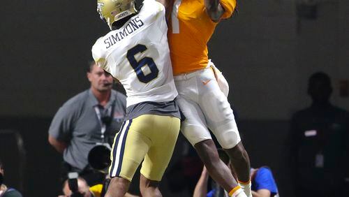Tennessee wide receiver Marquez Callaway (1) makes a catch for a touch down as Georgia Tech defensive back Lamont Simmons (6) defends in the second half of an NCAA college football game, Monday, Sept. 4, 2017, in Atlanta. (AP Photo/John Bazemore)