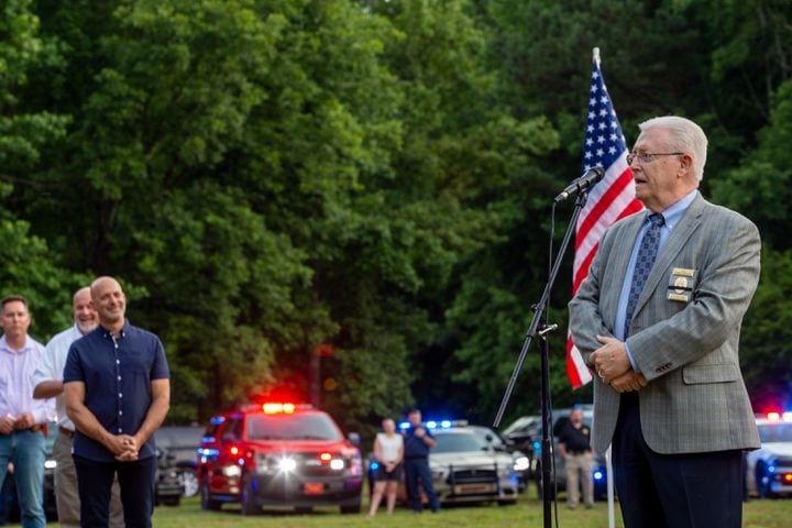 Holly Springs Police Chief Tommy Keheley speaks at the candlelight vigil held at Barrett Park on Friday, June 18, 2021 for Joe Burson, who was killed during a traffic stop earlier this week.    (Jenni Girtman for The Atlanta Journal-Constitution)