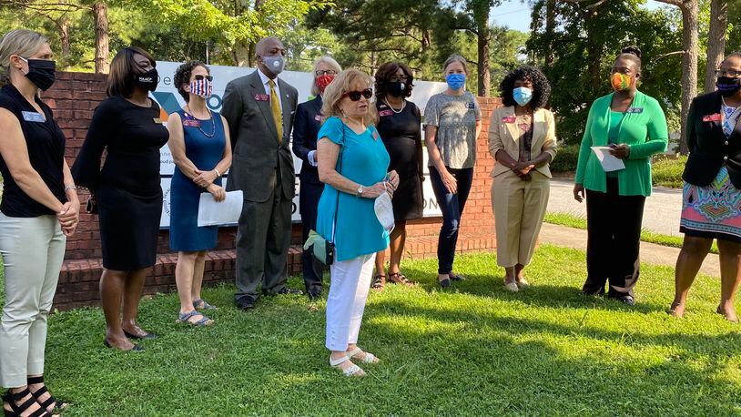 State Rep. Michele Henson, D-Stone Mountain, is flanked by other legislators from DeKalb County during a Monday morning press conference calling out Georgia labor commissioner Mark Butler over unpaid unemployment claims.