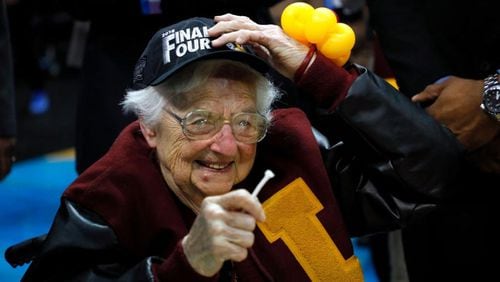 Sister Jean Dolores-Schmidt's image is now emblazoned on T-shirts and socks.