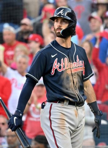 Braves shortstop Dansby Swanson strikes out during the sixth inning Saturday in Game 4 of the NLDS against the host Phillies. (Hyosub Shin / Hyosub.Shin@ajc.com)