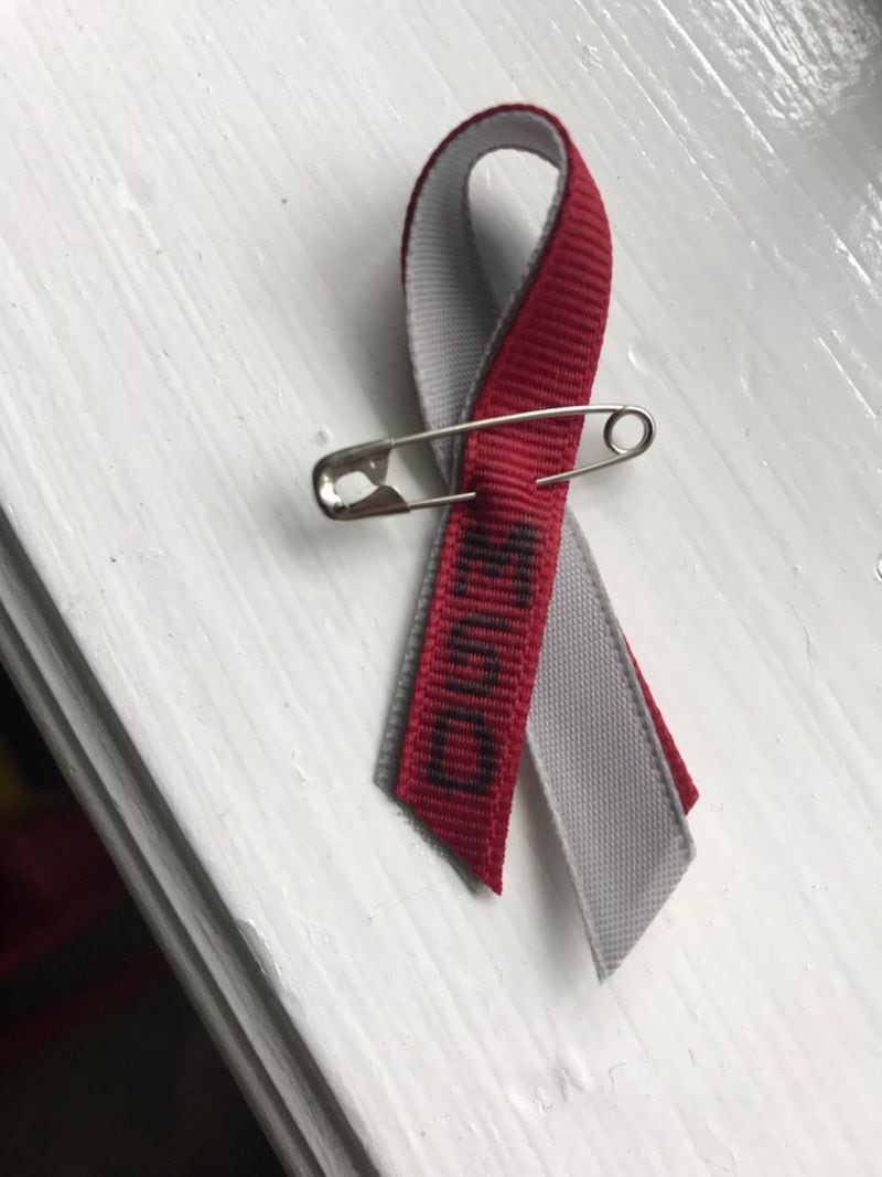 One of the hundreds of ribbons that Georgia Tech graduate Nicholas Thompson and his wife Christen made by hand for PGA Tour golfers, their wives and caddies to wear this week during the Honda Classic in support of the victims of the shooting at Marjory Stoneman Douglas High School.