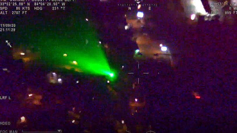 Fredy Contreras of Lilburn was arrested Monday after Gwinnett County police said they caught him on video shining a green laser at one of their helicopters.