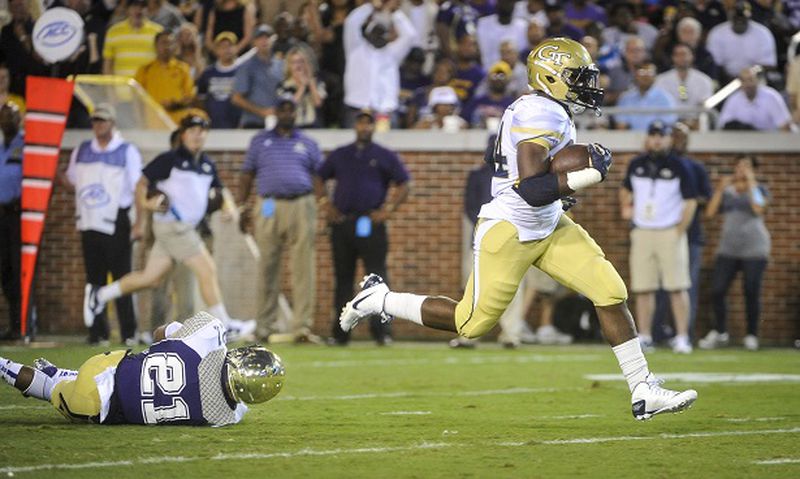 Georgia Tech running back Marcus Marshall (34) gets away from Alcorn State defensive back Quinton Cantue (21) as he runs for a touchdown during the first quarter of an NCAA college football game, Thursday, Sept. 3, 2015, in Atlanta. (AP Photo/John Amis)