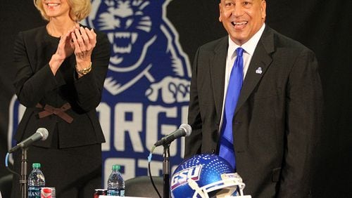 New Georgia State football coach Trent Miles is introduced by athletic director Cheryl Levick (left) at his introductory press conference at the GSU Sports Arena Dec. 3, 2012, in Atlanta.