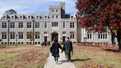 A student and faculty member walk along the quad at Oglethorpe University on Nov. 9, 2022. Oglethorpe University's enrollment reached its highest level at 1,494 students this fall. (Christina Matacotta for The Atlanta Journal-Constitution)