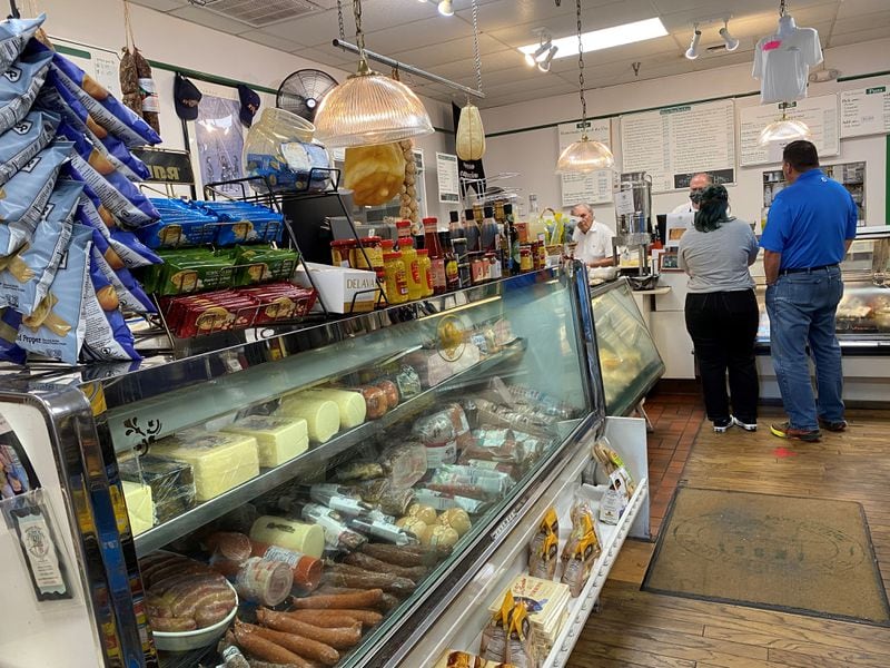 The deli case is stocked with a selection of meats and cheeses at E. 48th Street Market in Dunwoody. Bob Townsend for The Atlanta Journal-Constitution 