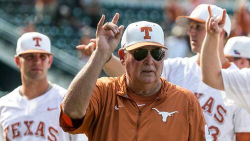 FILE - In this Saturday, May 21, 2016, file photo, Texas coach Augie Garrido sings "The Eyes of Texas" with the team after Texas defeated Baylor 7-6 in an NCAA college baseball game in Austin, Texas. Garrido, the winningest coach in college baseball history, is out after 20 seasons at Texas. The decision Monday, May 30, 2016, comes after the Longhorns' first losing season since 1998. . (Rodolfo Gonzalez/Austin American-Statesman via AP, File)