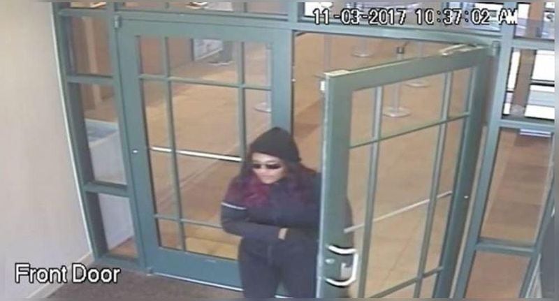 The woman on bank surveillance video is believed to be connected to several metro Atlanta bank robberies, the FBI said.