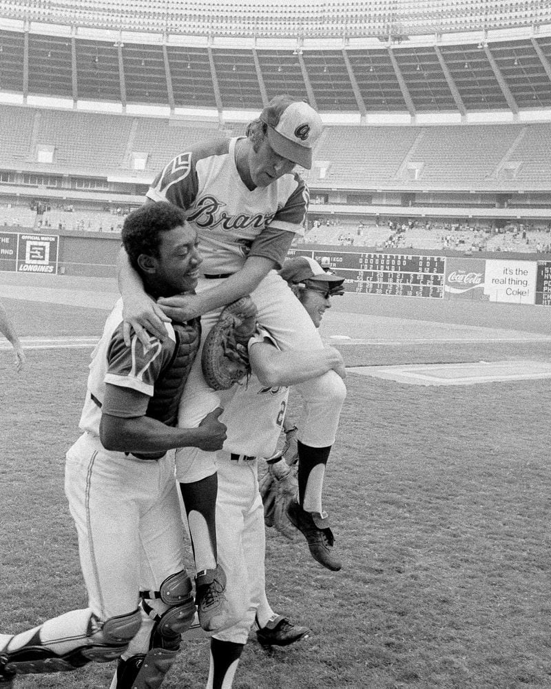 Atlanta Braves pitcher Phil Niekro is carried by catcher Paul Casanova and second baseman Chuck Goggin after completing a 9-0 no-hitter over the San Diego Padres Sunday, August 5, 1973, at Atlanta Stadium. The no-hitter by the knuckleball specialist was the first for the Braves since moving to Atlanta from Milwaukee. (Bill Hudson/AP)