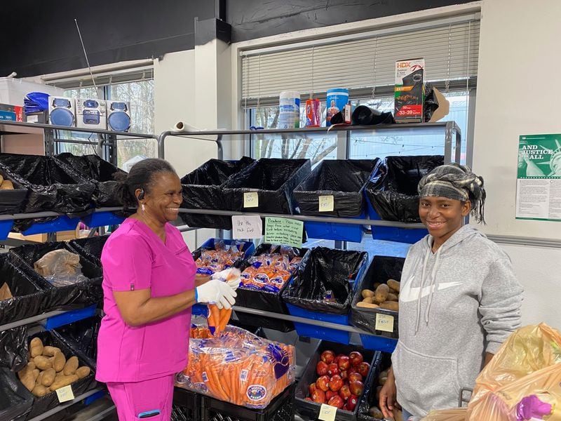 Volunteers bag fresh fruits and vegetables to give away at the Lawrenceville Co-Op Community Food Bank. Photo courtesy of the Lawrenceville Cooperative Ministry.