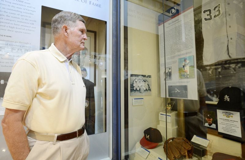 Former major league pitcher Bob Hendley of Macon looks at his display in the Georgia Sports Hall of Fame. Hendley while playing for the Chicago Cubs pitched a one-hitter against the Dodgers on Sept. 9, 1965 and lost to Sandy Koufax, who pitched a perfect game. (Jason Vorhees/For the AJC)