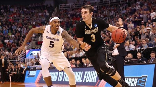 Luke Kornet (3) of the Vanderbilt Commodores drives against Dererk Pardon (5) of the Northwestern Wildcats in the first half during the first round of the 2017 NCAA Men’s Basketball Tournament at Vivint Smart Home Arena on March 16, 2017 in Salt Lake City, Utah. (Photo by Christian Petersen/Getty Images)